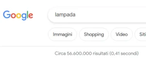 Barra di ricerca con volume di ricerca su Google per il termine "lampada"